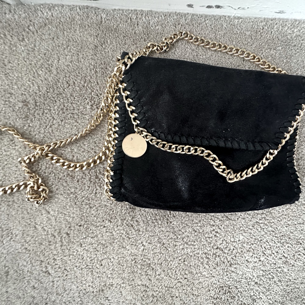 Black crossbody with gold chain hardware